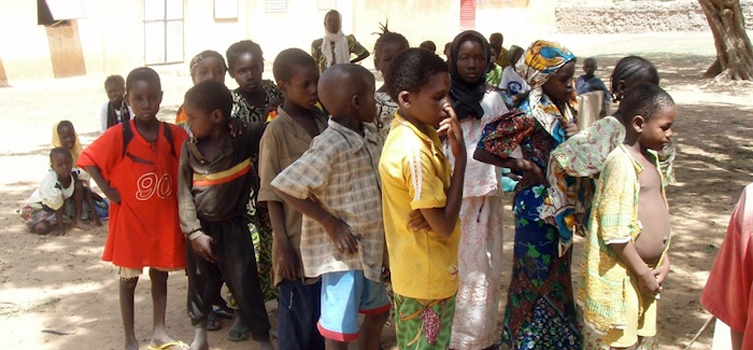 Schoolchildren queueing to be tested for schistosomiasis in Tanzania